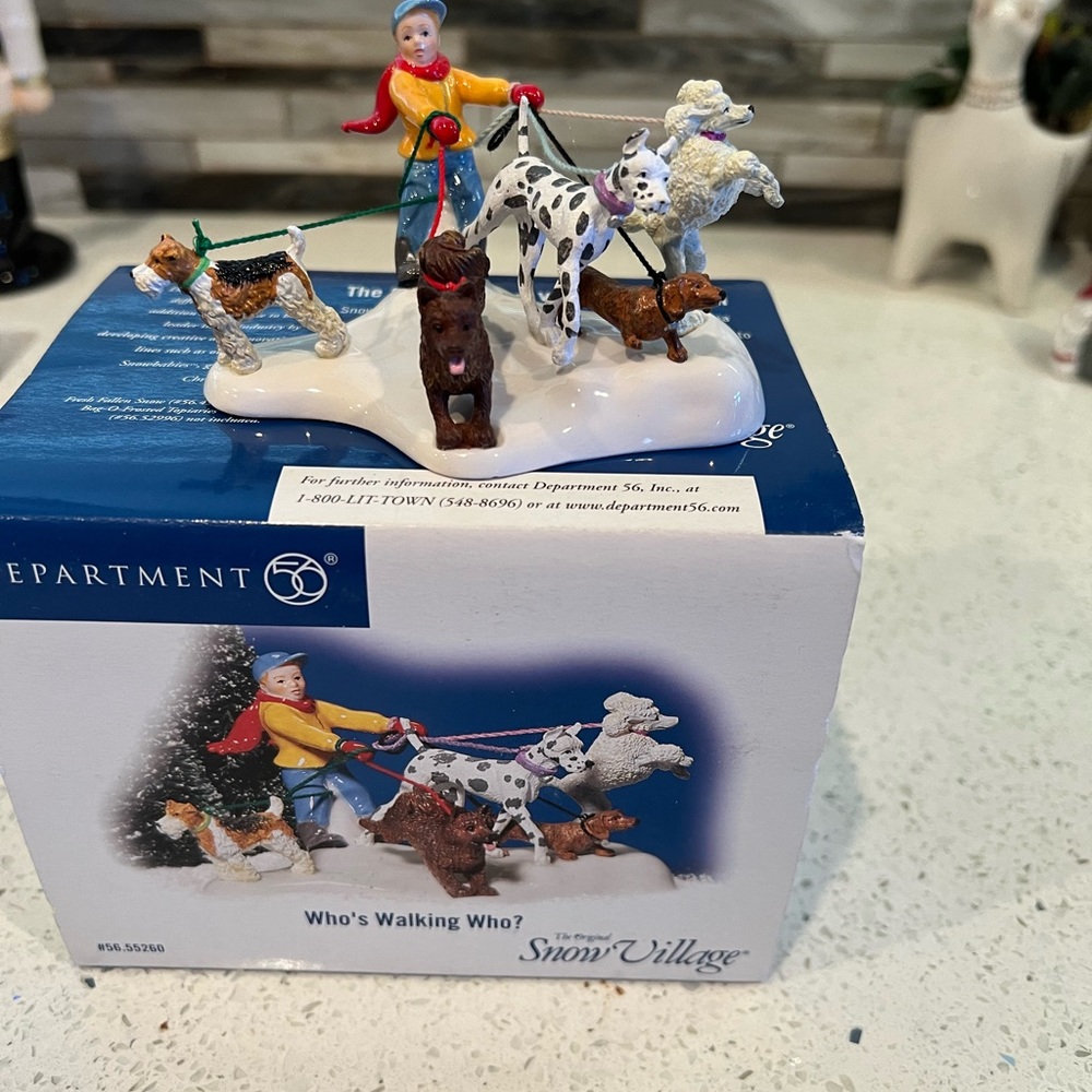 Dept 56 snow village Who’s walking Who?